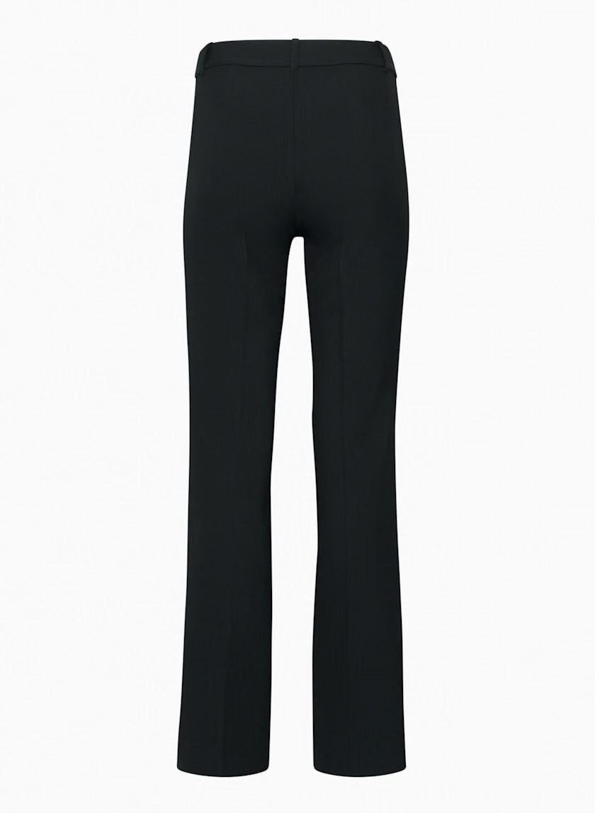 Studio shot of the back of Siamo Firenze black flare pants, highlighting the streamlined fit and seam detailing.